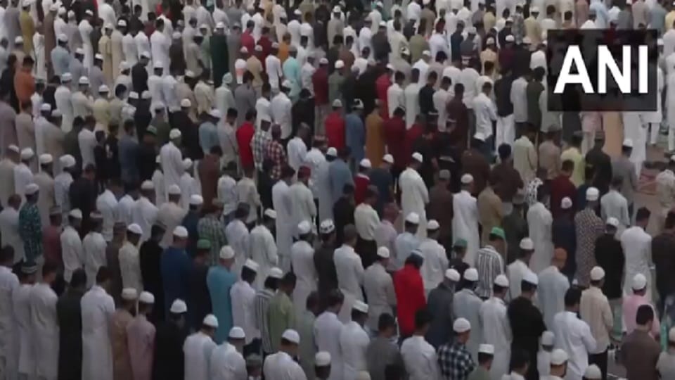 People offer morning Namaz at the Jama Masjid on the occasion of Eid Al Adha