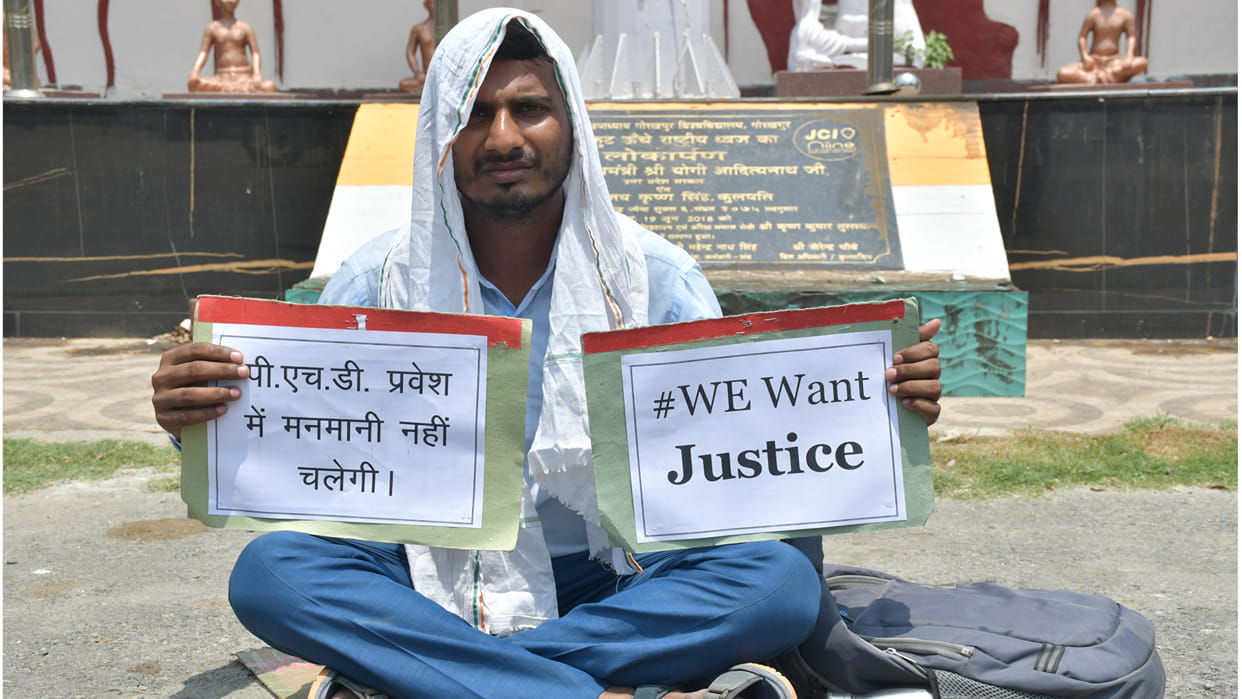 Students sit on dharna in front of Gorakhpur University main gate, allege arbitrariness in PhD admission