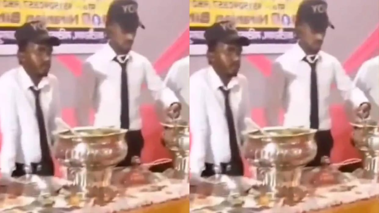 The caterer boy was watching Khan Sir video while serving food Video goes viral on Internet