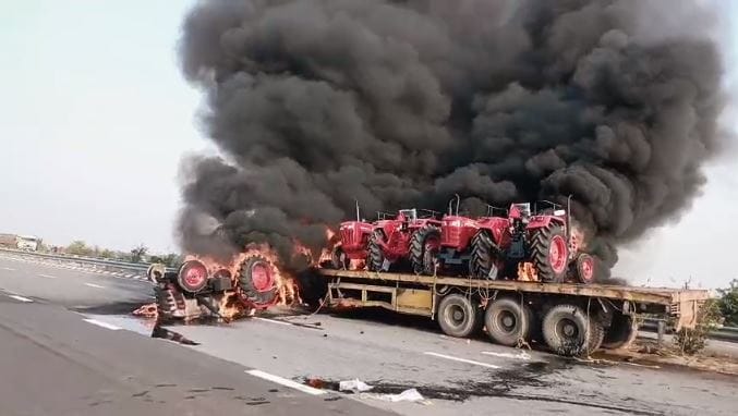 Explosion tyre of trailer seven new tractors caught fire in ghazipur flames visible for several kilometres