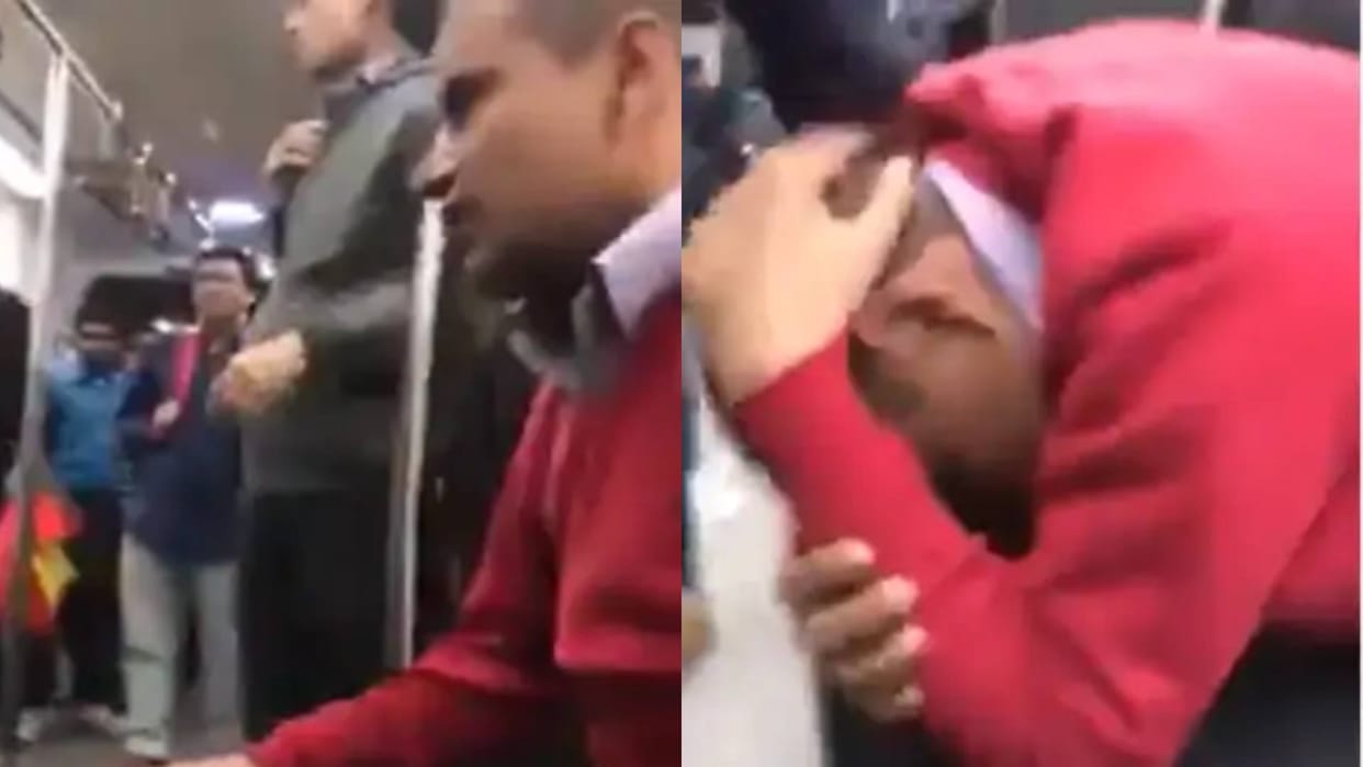 A fierce fight broke out in the metro just because of a push people abused each other Video goes viral