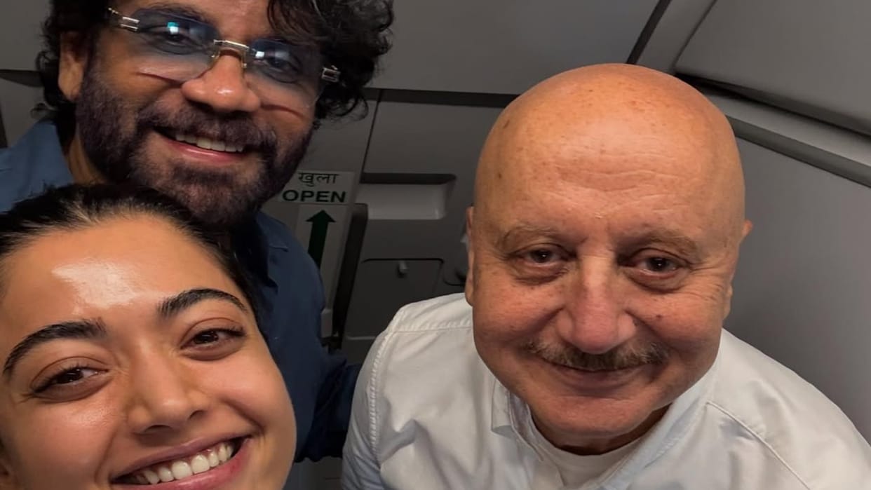 Anupam Kher share post with kubera stars nagarjuna and rashmika mandana from flight