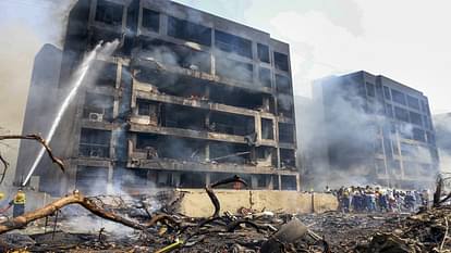 Ahmedabad Plane Crash Photos Air India Flight AI 171 debris Meghaninagar rescue operations NDRF Gujarat Police