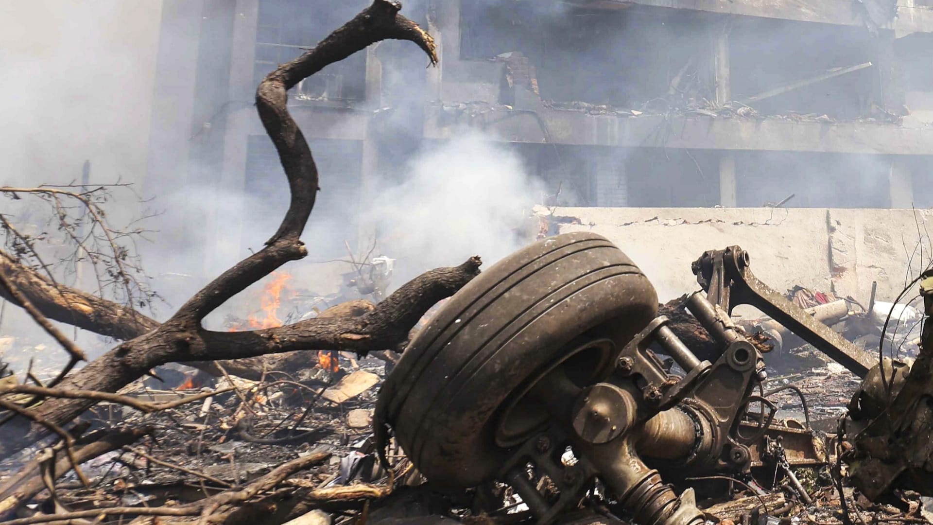 Ahmedabad Plane Crash Photos Air India Flight AI 171 debris Meghaninagar rescue operations NDRF Gujarat Police