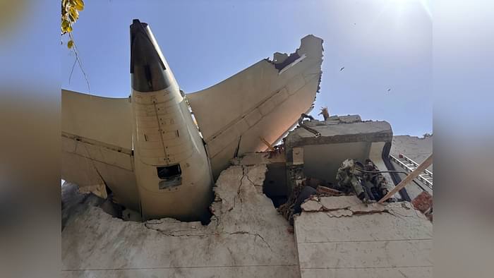 Ahmedabad Plane Crash Photos Air India Flight AI 171 debris Meghaninagar rescue operations NDRF Gujarat Police