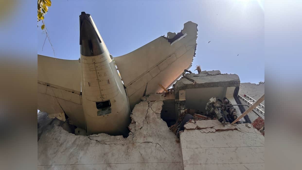 Ahmedabad Plane Crash Photos Air India Flight AI 171 debris Meghaninagar rescue operations NDRF Gujarat Police