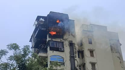 Couple dies of suffocation from smoke in Jagatpuri fire started from a lamp in a temple intensified by a compr