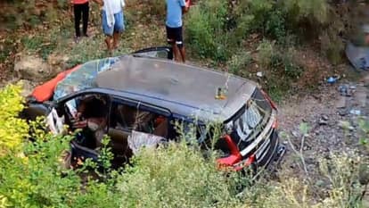 High speed car collided with divider and overturned in drain, two people died and two injured, accident happen