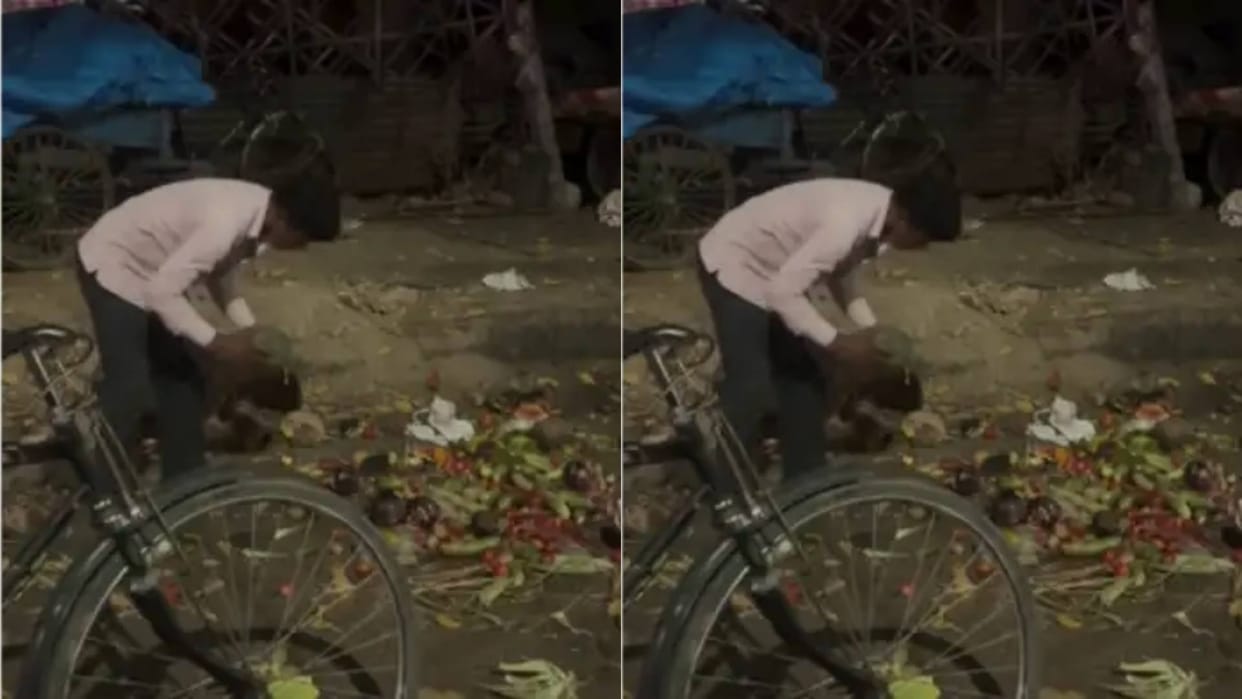 A father was seen picking up vegetables lying on the road at midnight Video goes Viral on Internet