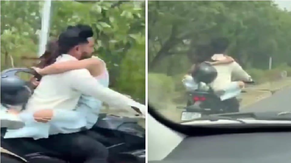 Video of young man and woman romancing on bike in Noida goes viral police issues challan