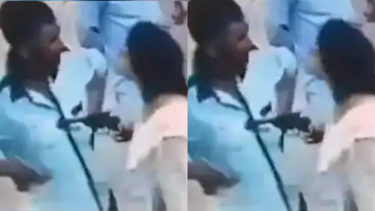 Woman arrives to fill CNG in car when salesman asks her to get down she points gun Video goes Viral