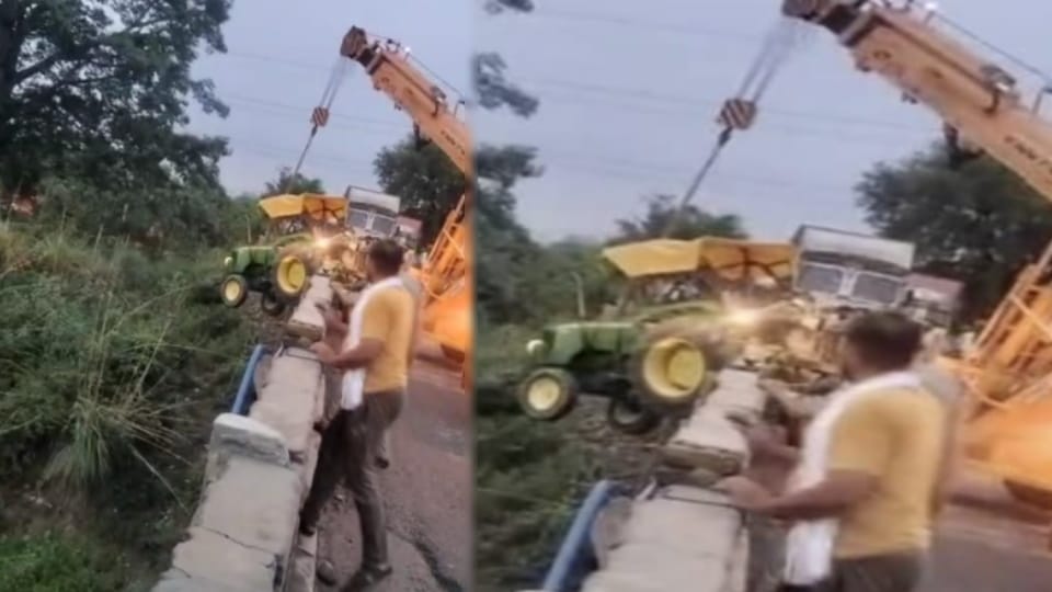 Tractor-Trolley Hangs on Bridge After Container Crash in Mandawali, many Saved