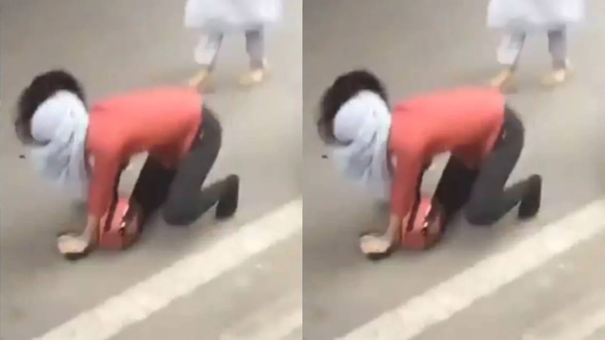 Bike driver slapped a woman so hard that she fell on the road Video goes Viral on Internet