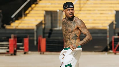 Chris Brown pleads not guilty to charge that he beat injured music producer in London