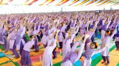 More than 25 thousand tribal students created a world record of Surya Namaskar in Visakhapatnam