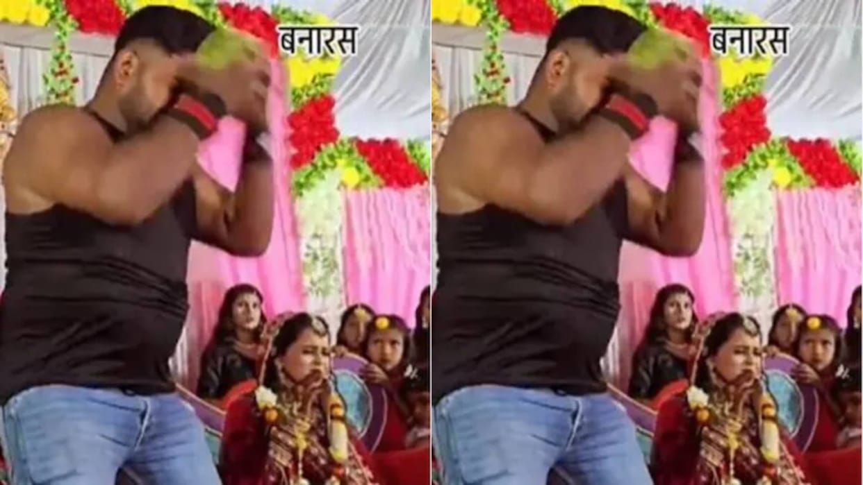 During the jaimala ceremony a man broke a coconut with his head the bride was shocked to see the drama