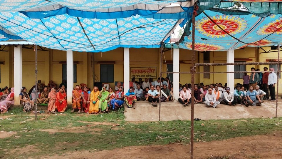 63 year old school merged villagers took to the streets to protest in Balod