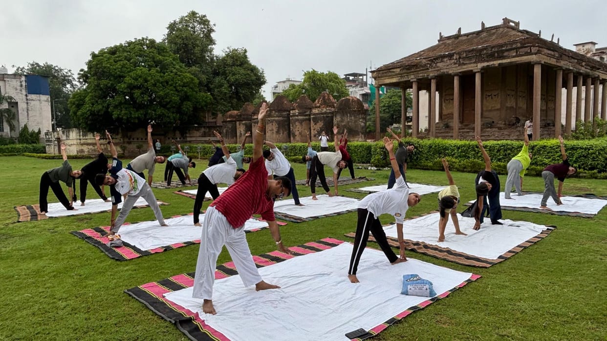 A grand yoga camp was organized at the Gurudham temple complex in Bhelupur on International Yoga Day