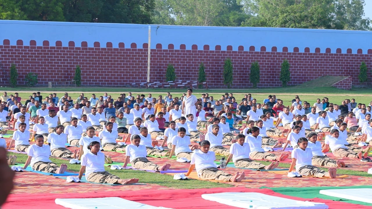 Officers and policemen performed yoga in the police line ground in Bareilly