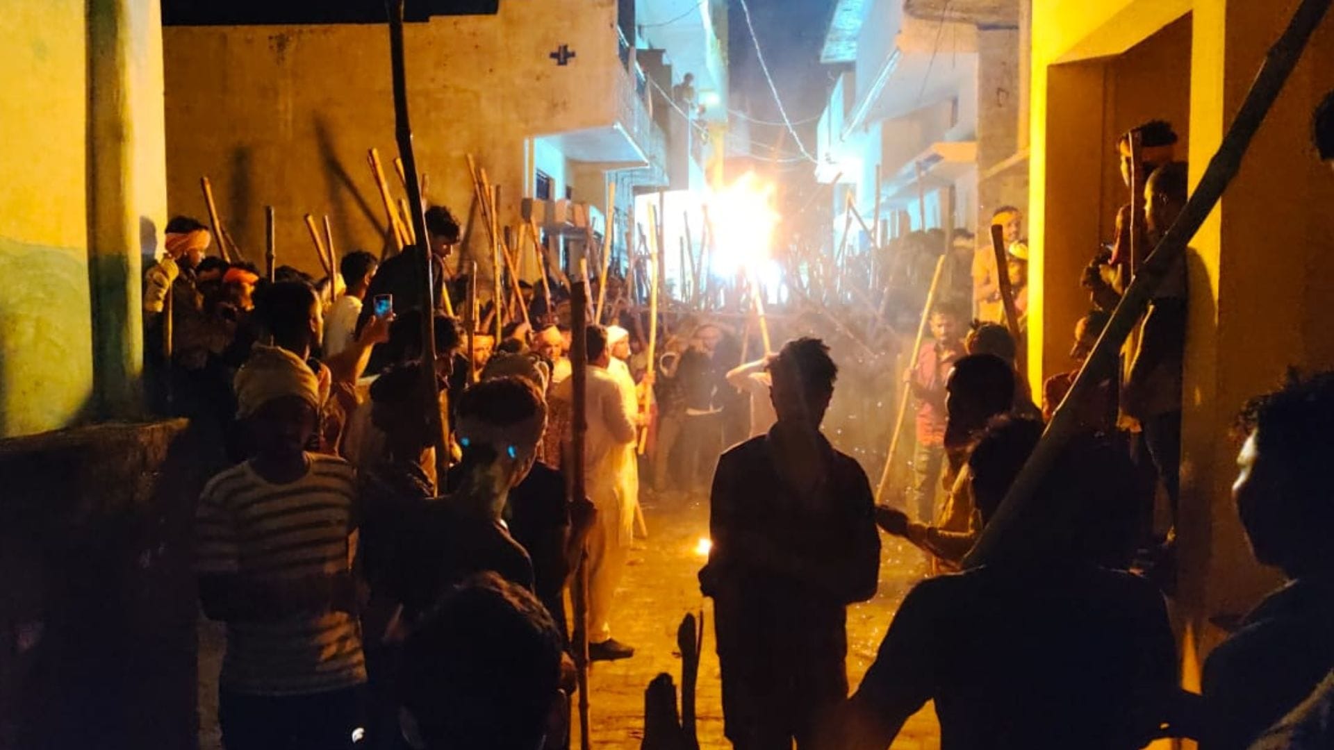 Bharat Akhara procession in ballia Devotion and bravery were on display devotees swung sticks