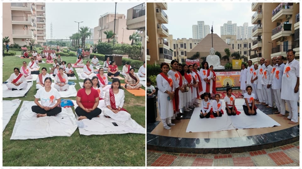 Parents did yoga with children in S K Society Eta-2