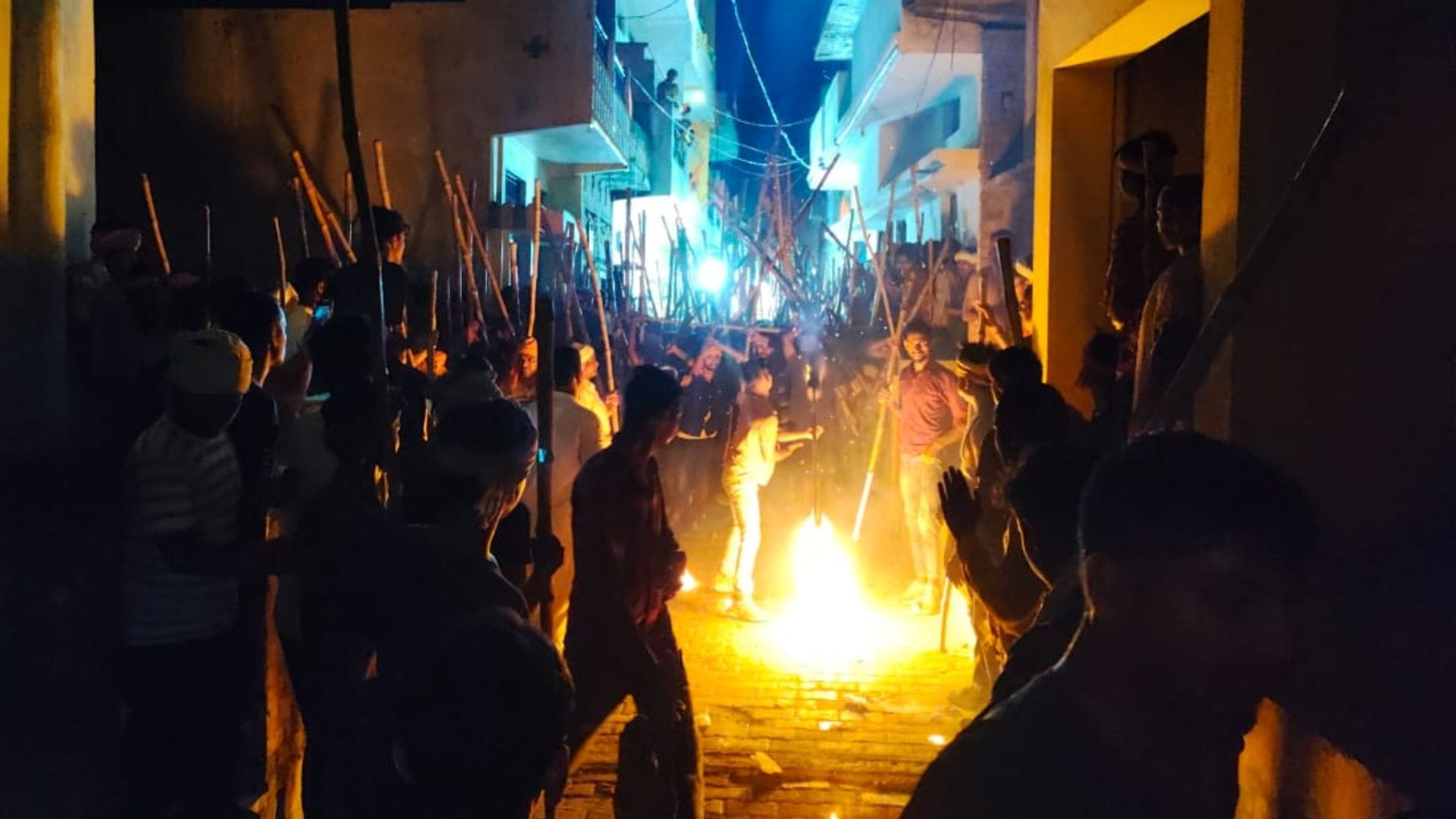Bharat Akhara procession in ballia Devotion and bravery were on display devotees swung sticks