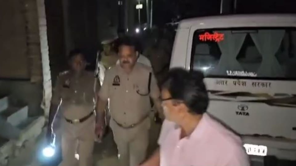 The sleeping husband was attacked on the neck, when the wife woke up she kicked him in the stomach