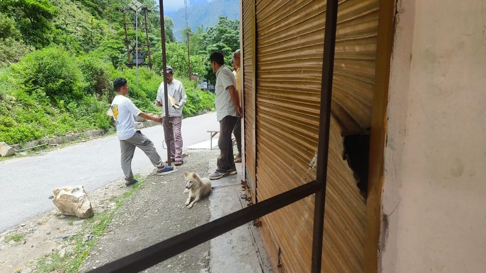 Boulder fell from the hill in Bangapani market