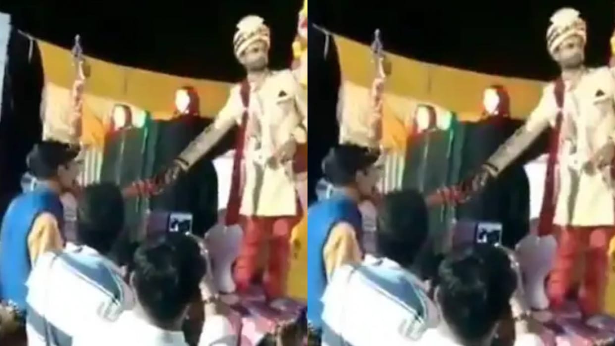 The bride held the grooms hand with one hand and took out a gun with other hand and fired video goes viral