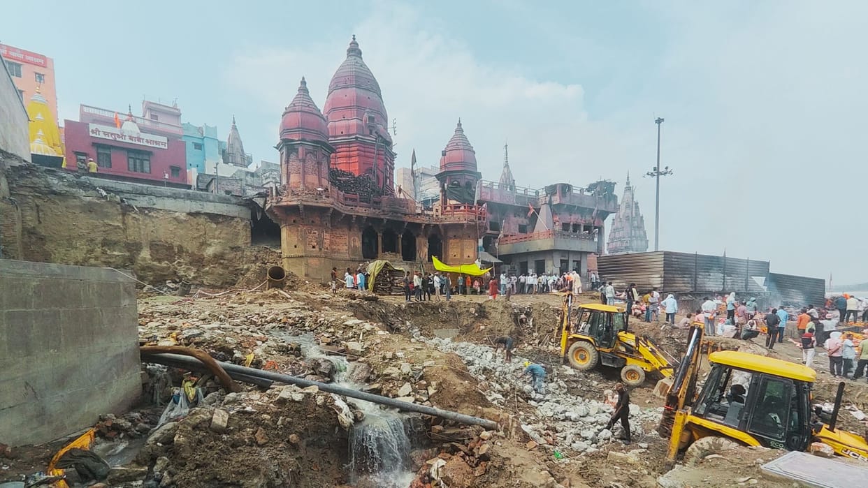 Varanasi News Video of temple demolished with bulldozer Manikarnika Ghat goes viral official denies incident