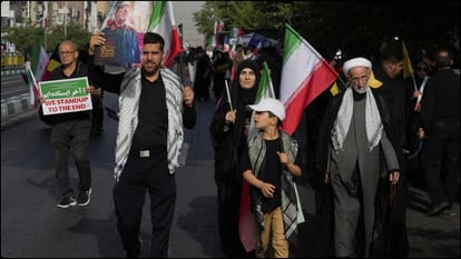 Hundreds of thousands mourn top Iranian military commanders, scientists killed in Israeli strikes