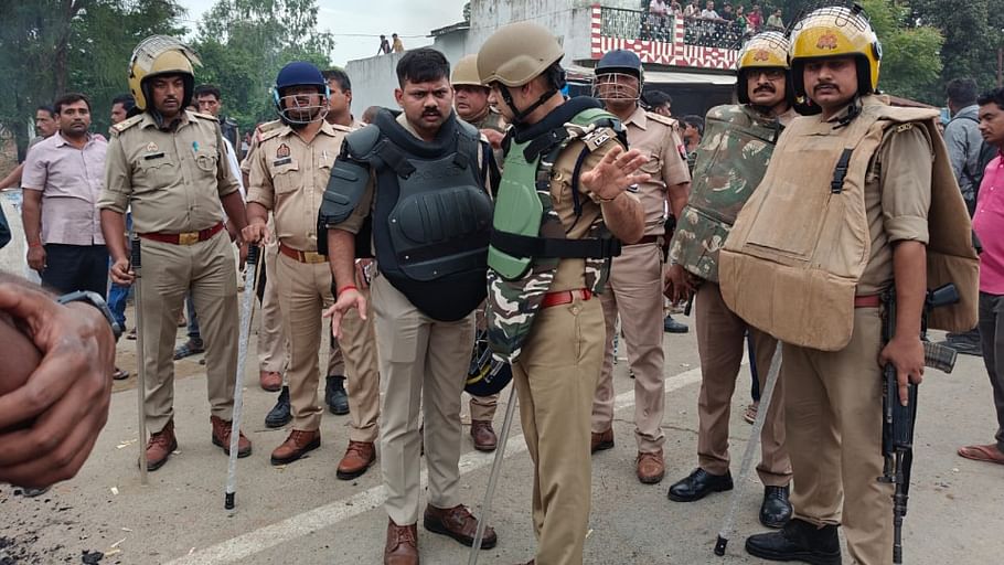 Prayagraj riot Story Bikes were burnt and buses were vandalized Bricks and stones were scattered on roads