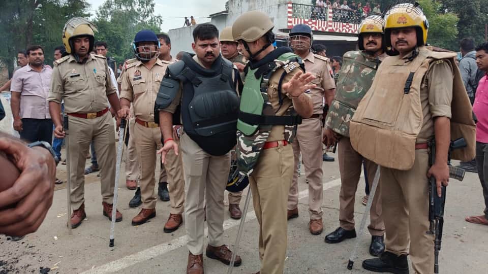 Prayagraj riot Story Bikes were burnt and buses were vandalized Bricks and stones were scattered on roads