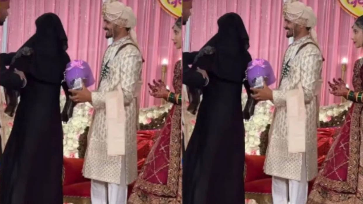 A girl wearing a burqa came on stage to hug the groom the bride was shocked video goes Viral on Internet
