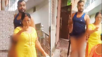 वायरल वीडियो से निकाली गई फोटो, युवक के हाथ में राइफल।