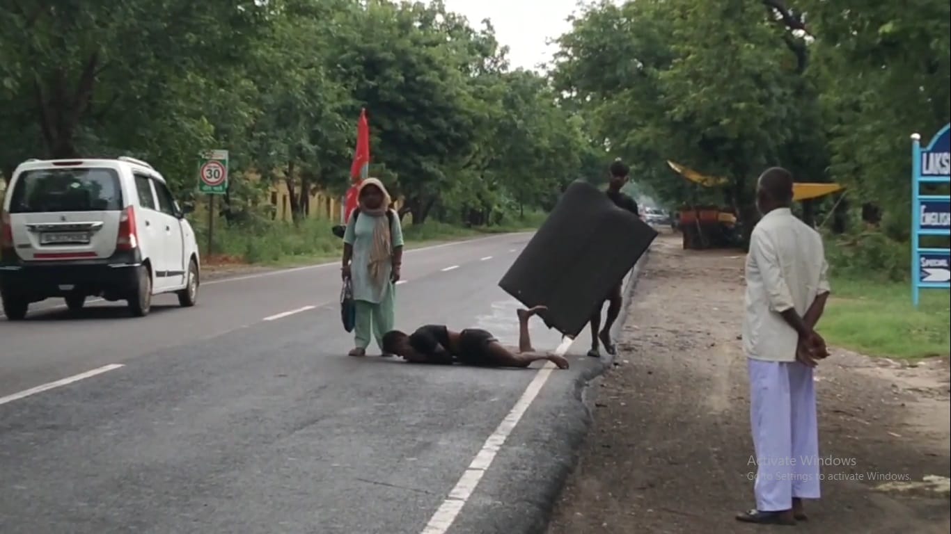 man is going to Mehandipur Balaji by lying down to get a son