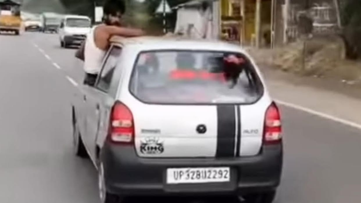 Doing stunts  moving car proved costly police filed   case  confiscated  car