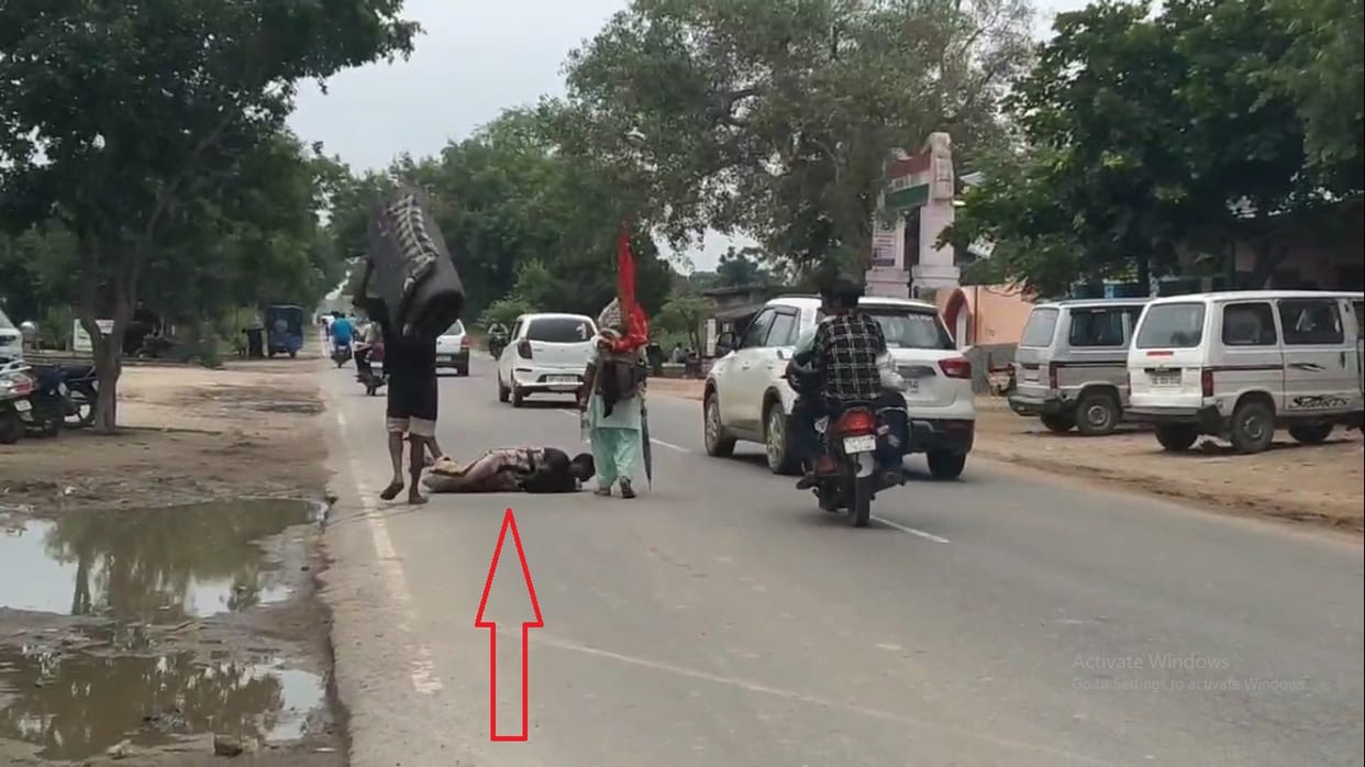 man is going to Mehandipur Balaji by lying down to get a son