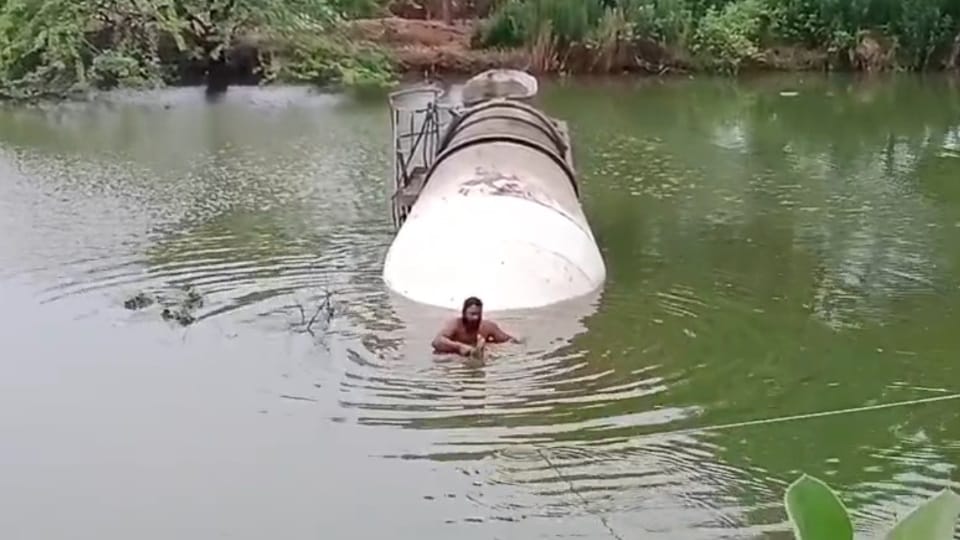 Truck crushes bike and falls into pond in Moga