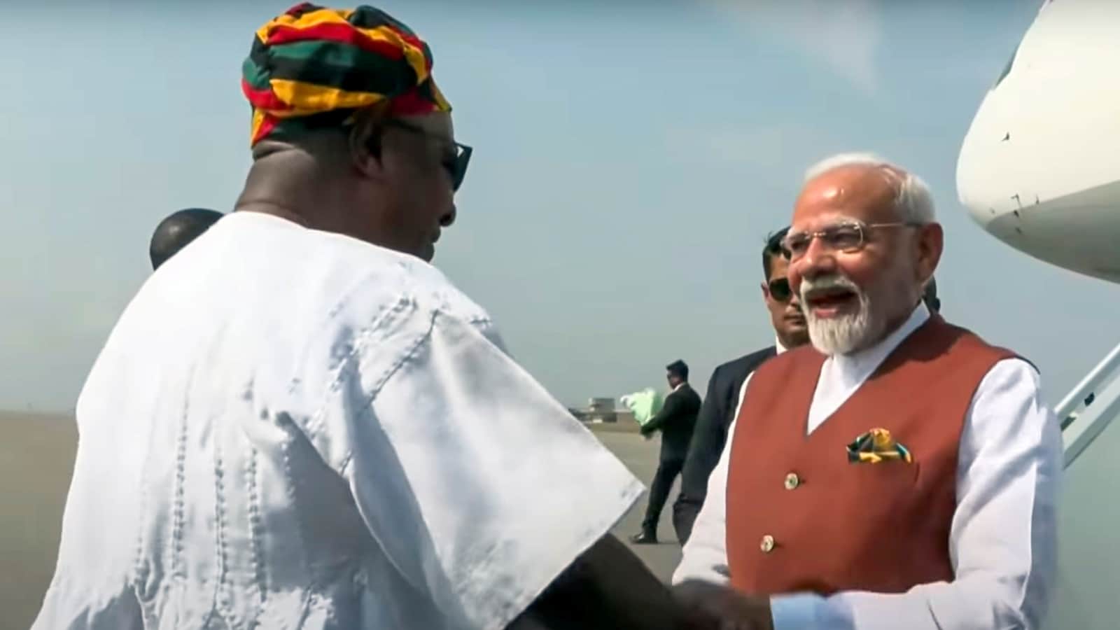 PM Modi Ghana Visit Photos Indians in Africa Children Paintings Indians welcome modi to Accra