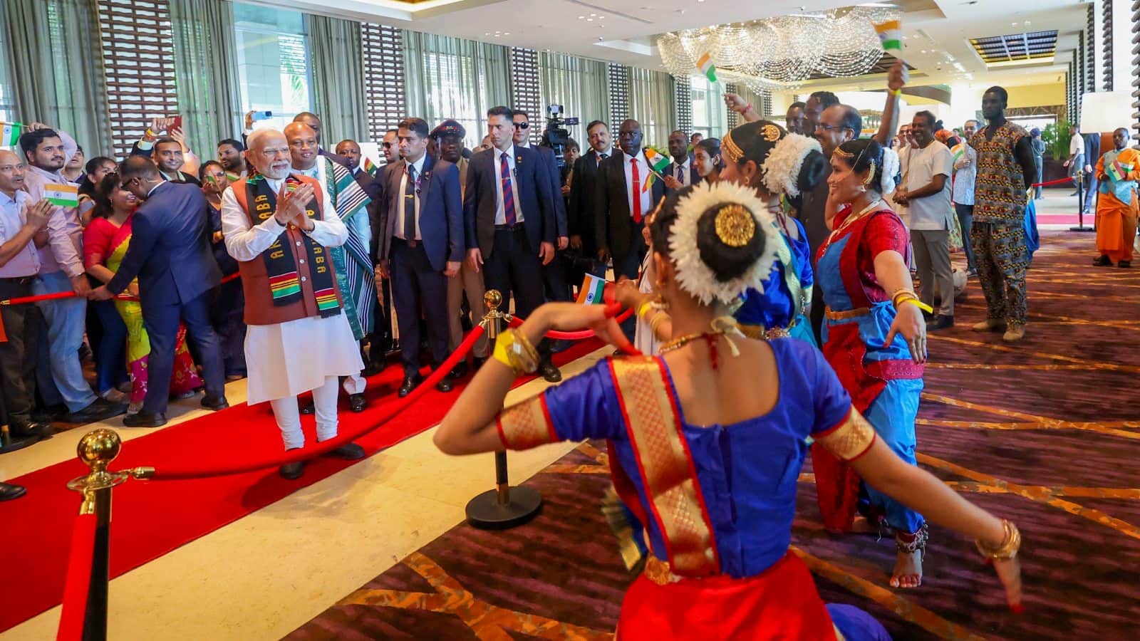 PM Modi Ghana Visit Photos Indians in Africa Children Paintings Indians welcome modi to Accra