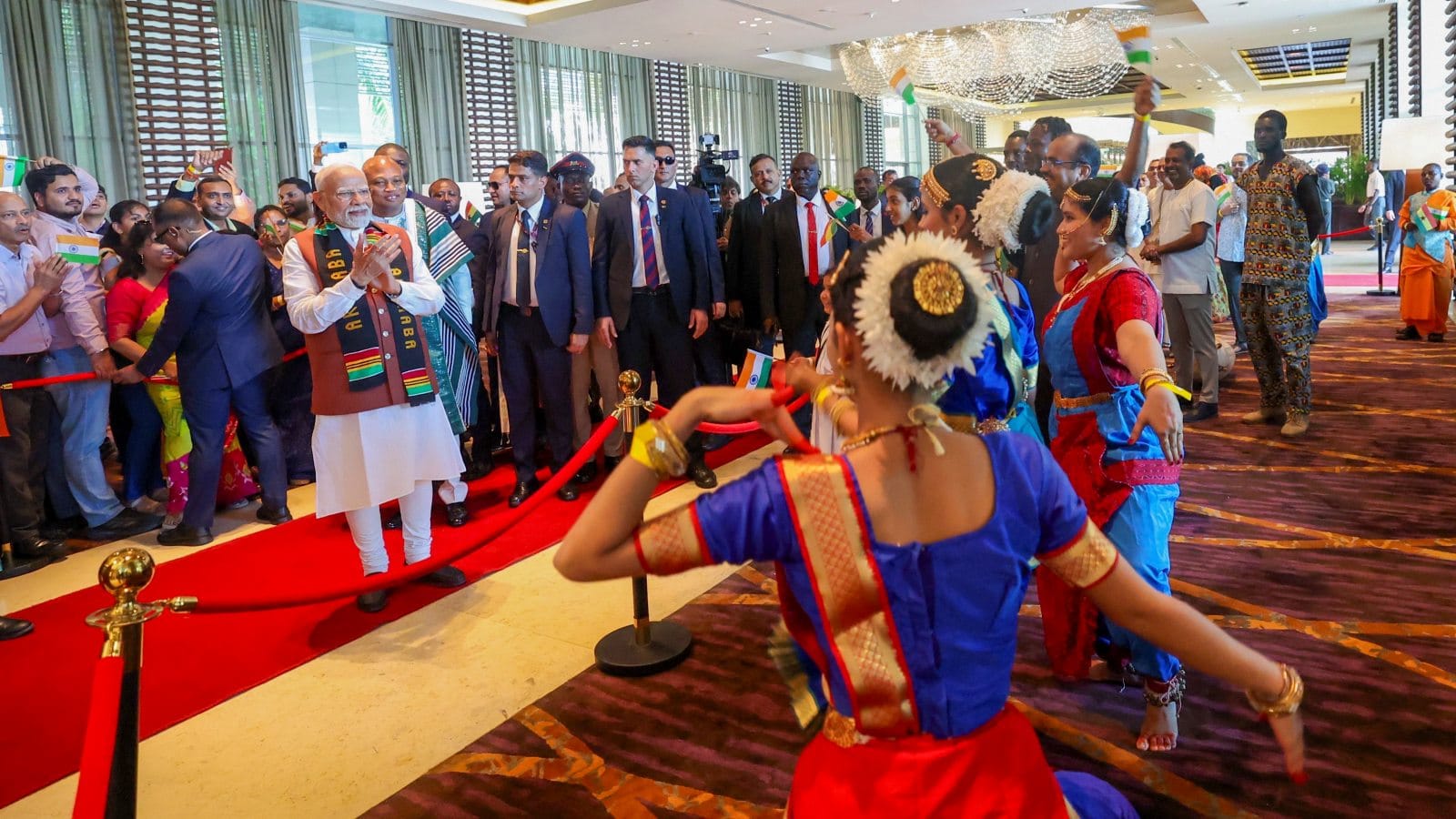 PM Modi Ghana Visit Photos Indians in Africa Children Paintings Indians welcome modi to Accra