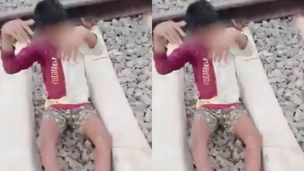 Child made a reel by lying in front of a moving train people were stunned RPF took action Video goes Viral