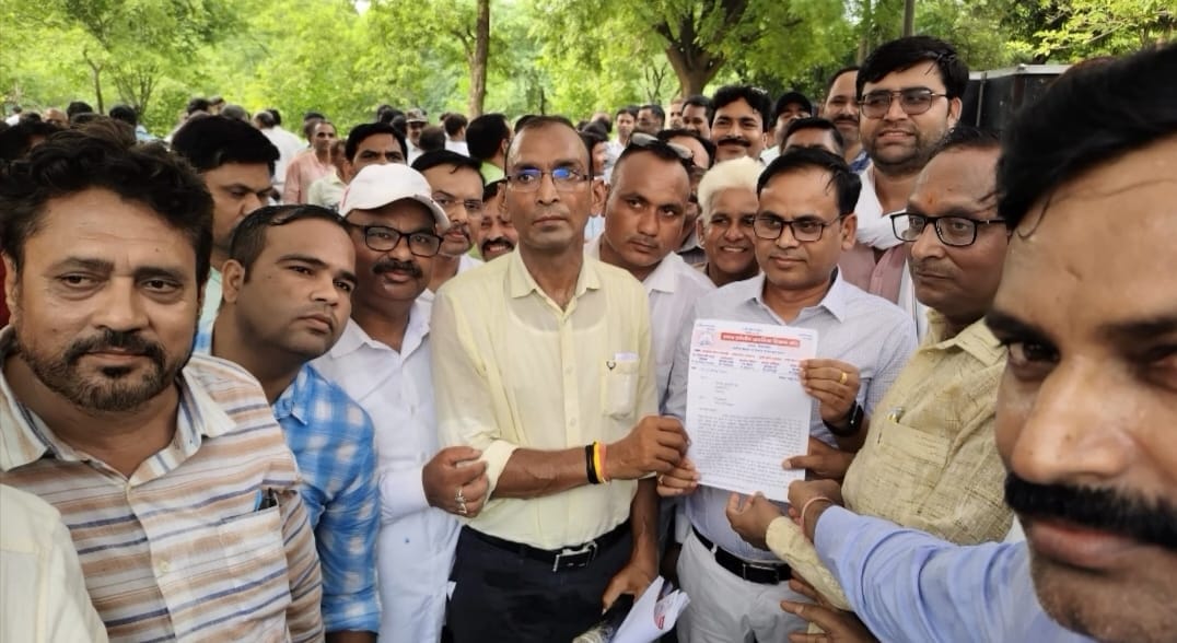 Teachers protest against merger of schools