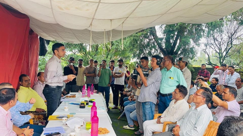 Dehradun DM Savin Bansal Crossed river and Reached Batoli village By walking which was cut off due to heavy ra