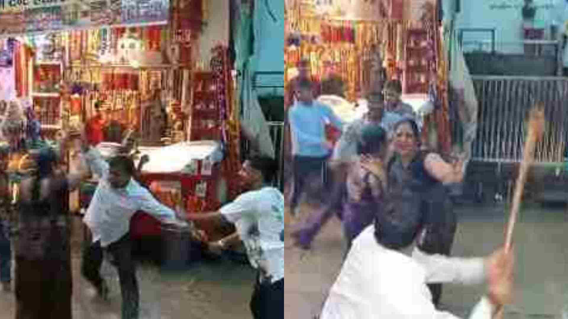 श्रद्धालुओं के बीच चली लाठियां।