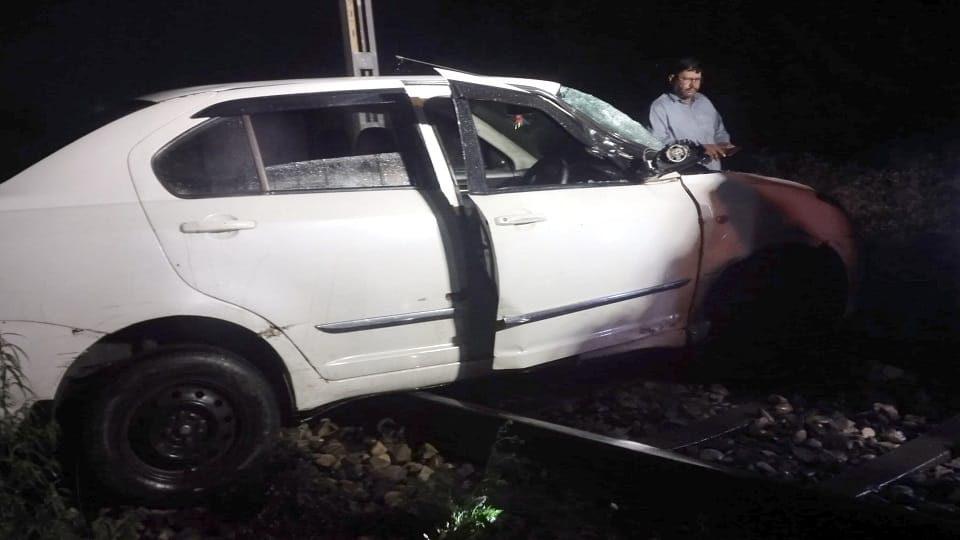 Car stuck on railway track accident averted after applying emergency brake