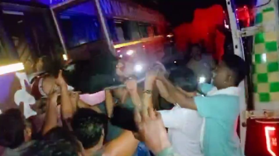 A bus full of passengers collided with a parked truck, driver and conductor seriously injured