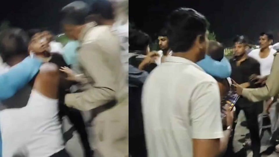 car driver hit five people crowd beat him up pushed and shoved a policeman