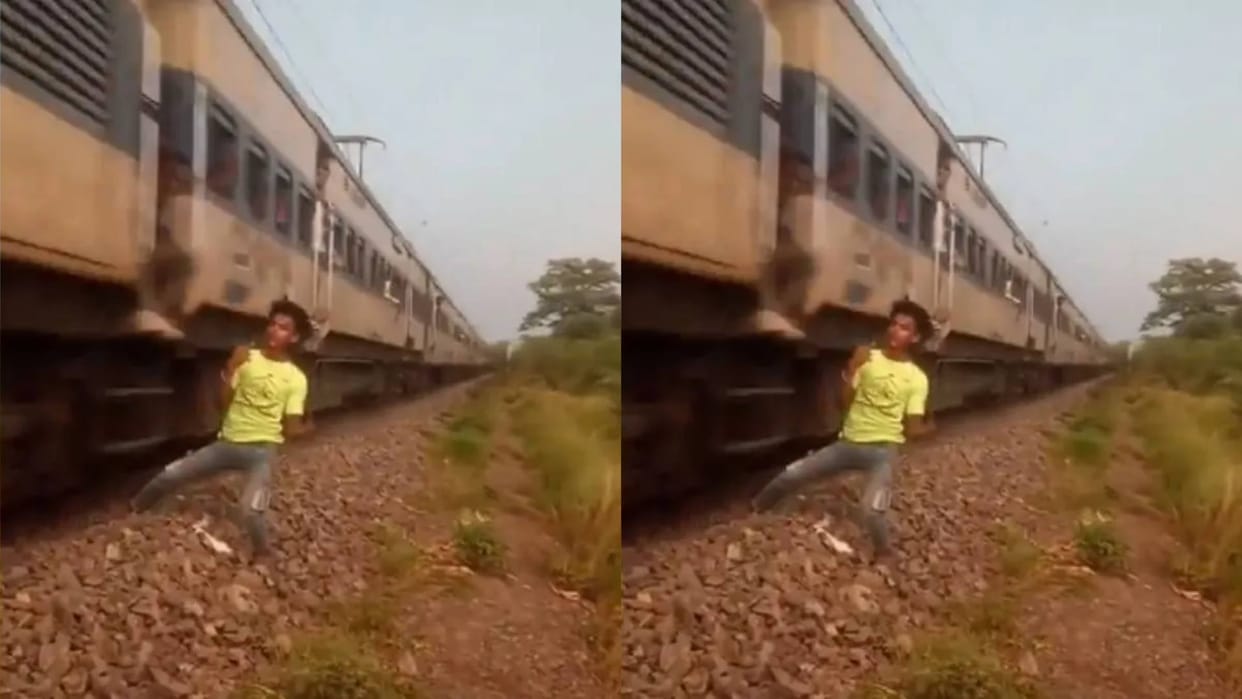 The boy was getting reel made on the railway track suddenly his foot got stuck and the train came Video Viral